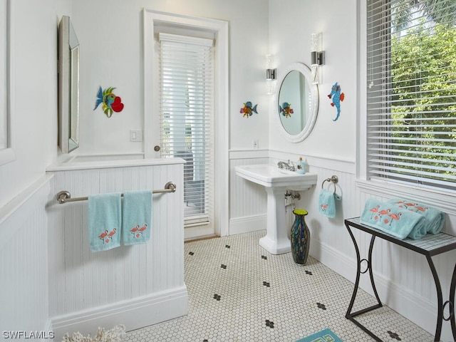 bathroom with tile patterned flooring and sink