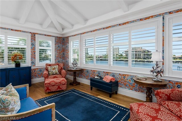 sunroom with beamed ceiling