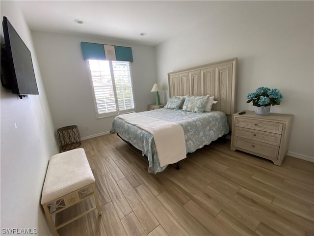 bedroom featuring light hardwood / wood-style floors