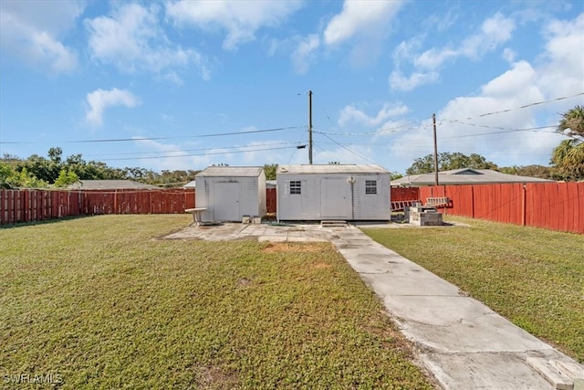 exterior space featuring a yard and a shed