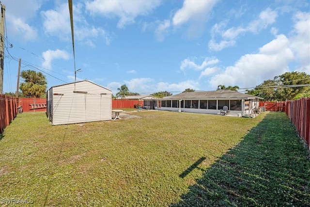 view of yard with a sunroom