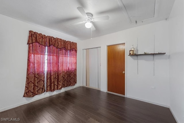 spare room featuring ceiling fan and wood-type flooring