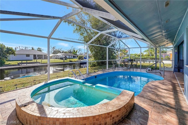 view of swimming pool featuring a water view, a patio area, a pool with connected hot tub, and glass enclosure