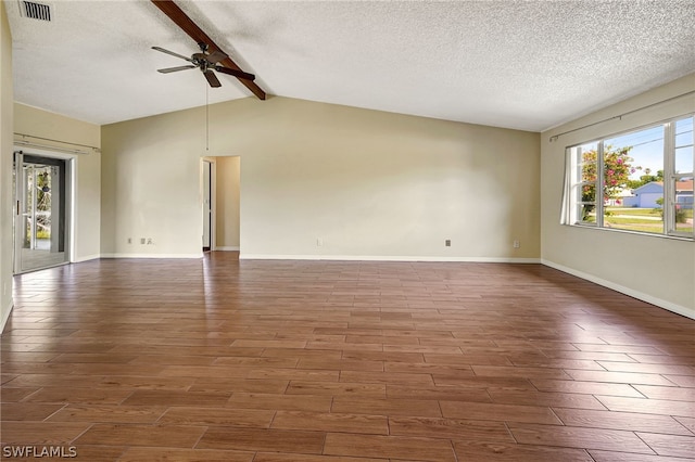 unfurnished room featuring a ceiling fan, a textured ceiling, visible vents, and wood finished floors