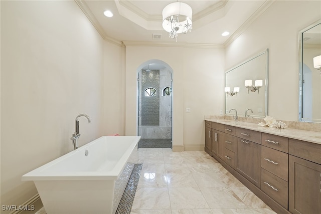 bathroom with vanity, crown molding, plus walk in shower, and a raised ceiling