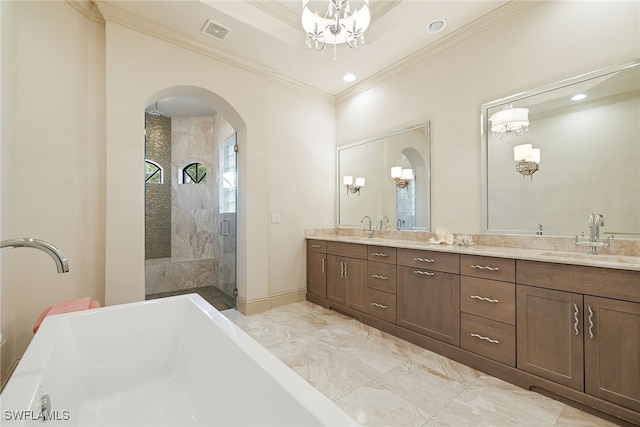 bathroom featuring vanity, an inviting chandelier, ornamental molding, and independent shower and bath