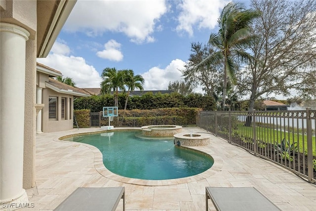 16540 Cellini Ln, Naples, FL 34110 - view of swimming pool featuring fence, a pool with connected hot tub, and a patio area