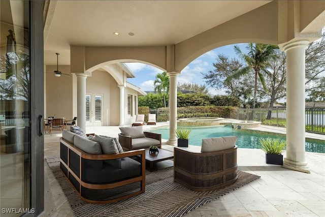 16540 Cellini Ln, Naples, FL 34110 - view of patio featuring a pool with connected hot tub, fence, french doors, and outdoor lounge area