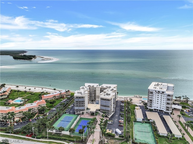 bird's eye view with a beach view and a water view