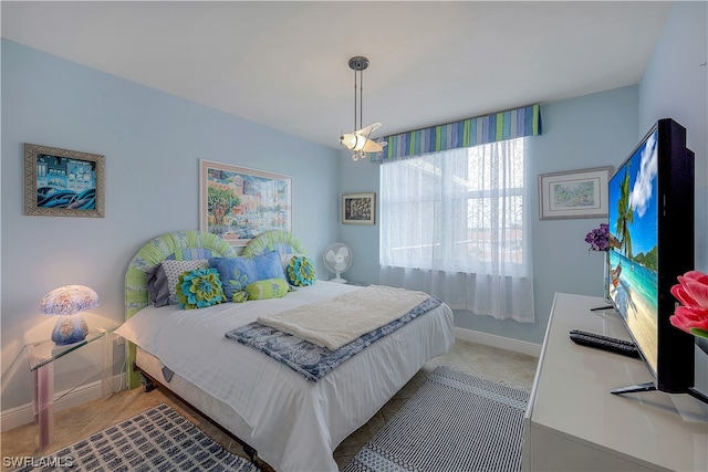 bedroom featuring light tile flooring