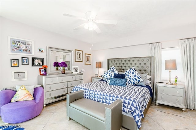 tiled bedroom with ceiling fan