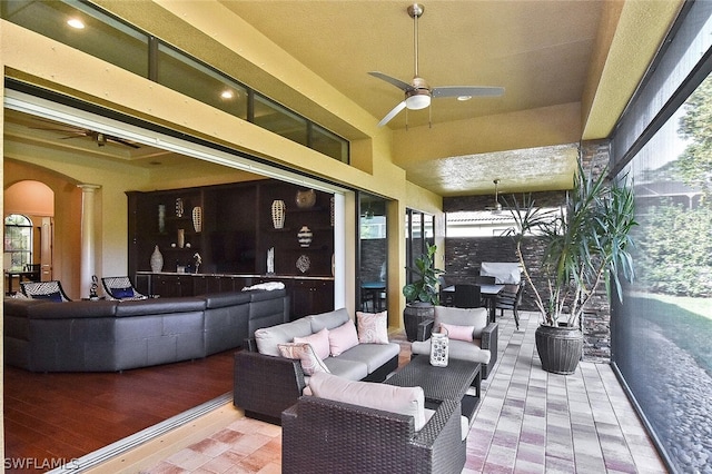 view of patio with an outdoor hangout area and ceiling fan