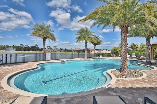 view of swimming pool featuring a patio area