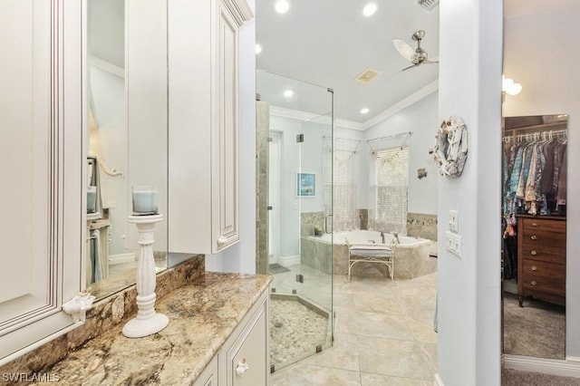 bathroom featuring vanity, ceiling fan, vaulted ceiling, and separate shower and tub