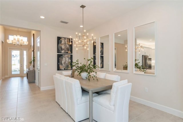 dining space featuring light tile patterned flooring, recessed lighting, visible vents, baseboards, and an inviting chandelier