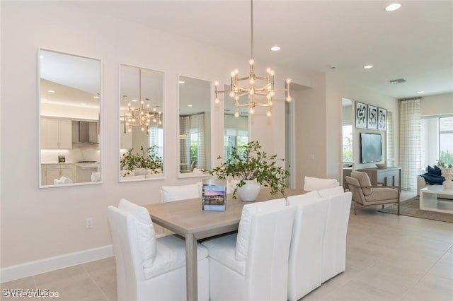 dining area featuring recessed lighting, baseboards, visible vents, a notable chandelier, and light tile patterned flooring