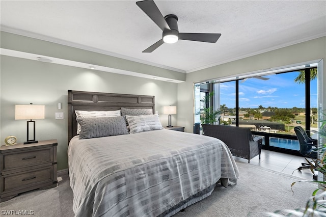 tiled bedroom with access to outside, crown molding, and ceiling fan