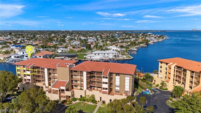 bird's eye view with a water view