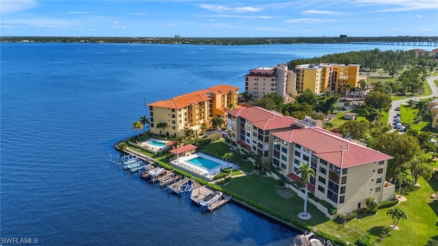 birds eye view of property featuring a water view