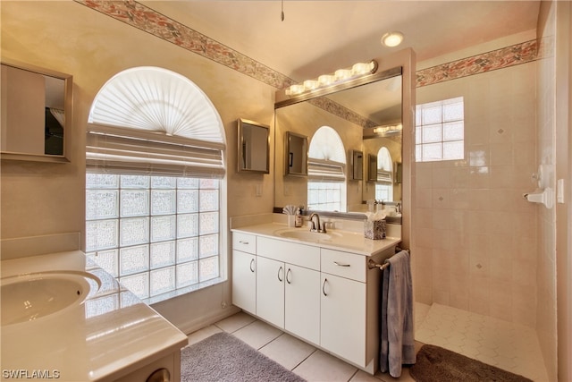 bathroom featuring tile floors and oversized vanity