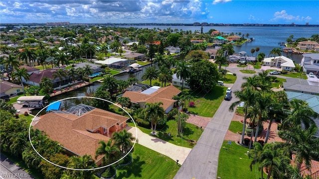 drone / aerial view featuring a water view