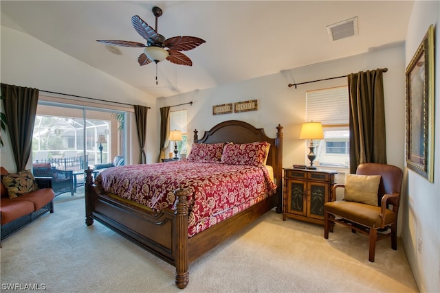 carpeted bedroom with vaulted ceiling, access to exterior, and ceiling fan