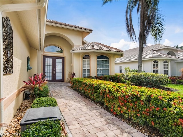 property entrance featuring french doors