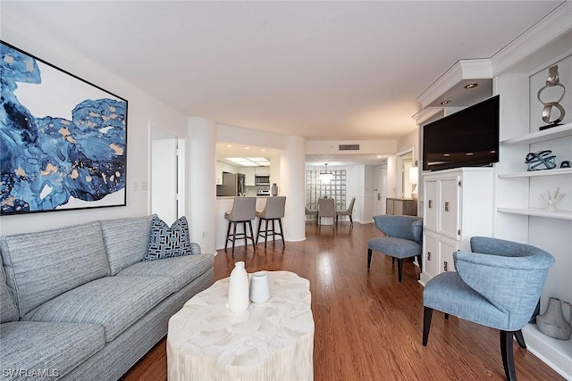 living room with dark hardwood / wood-style floors