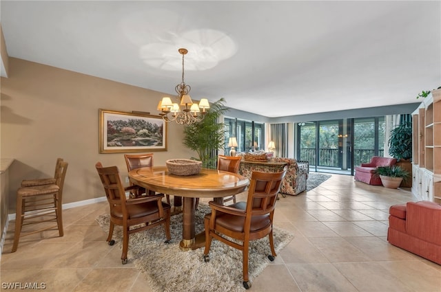 6040 Pelican Bay Blvd Unit D-105, Naples, FL 34108 - tiled dining room featuring a notable chandelier