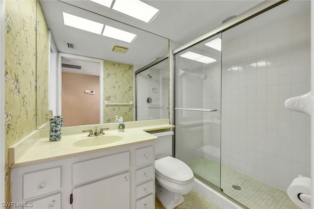 6040 Pelican Bay Blvd Unit D-105, Naples, FL 34108 - bathroom featuring walk in shower, tile floors, large vanity, and toilet