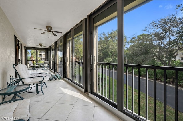 6040 Pelican Bay Blvd Unit D-105, Naples, FL 34108 - sunroom featuring ceiling fan