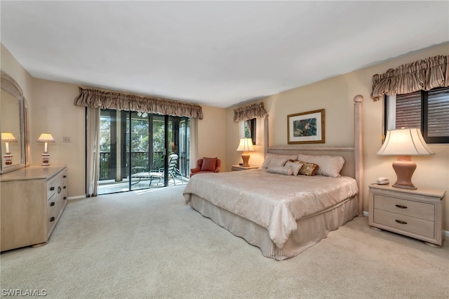 6040 Pelican Bay Blvd Unit D-105, Naples, FL 34108 - bedroom with light carpet and access to outside