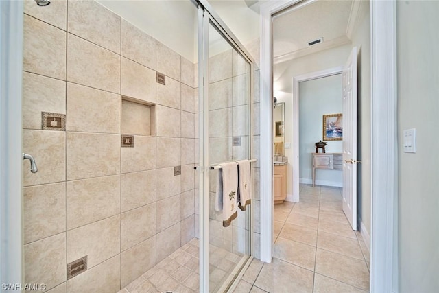 full bathroom featuring baseboards, visible vents, a stall shower, and tile patterned floors