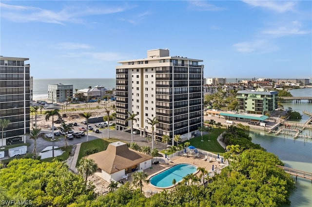 birds eye view of property with a water view