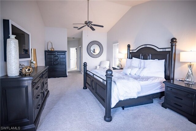 carpeted bedroom with lofted ceiling and ceiling fan