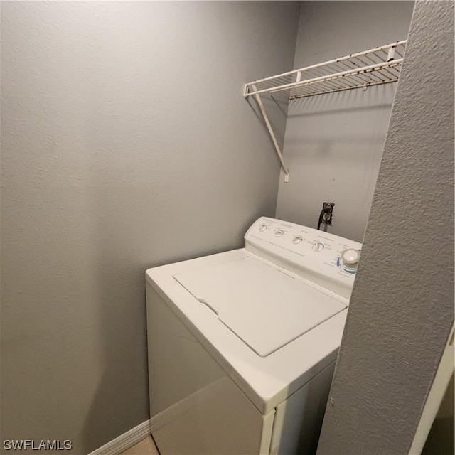 laundry area with washer / dryer