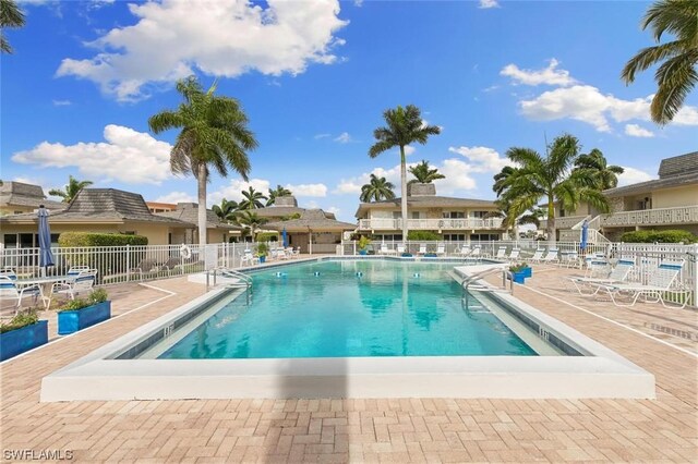 view of swimming pool with a patio area