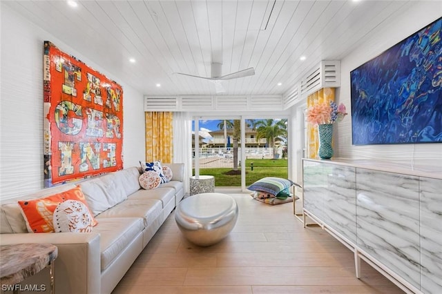 living room featuring hardwood / wood-style flooring and wooden ceiling