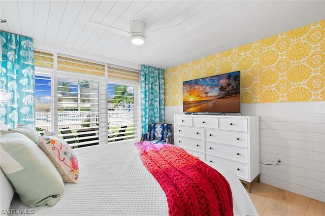 bedroom featuring wood ceiling and light wood-type flooring