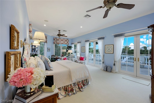 carpeted bedroom with access to outside, ceiling fan, french doors, and crown molding