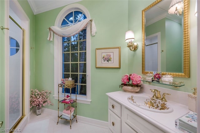 bathroom with vanity and crown molding