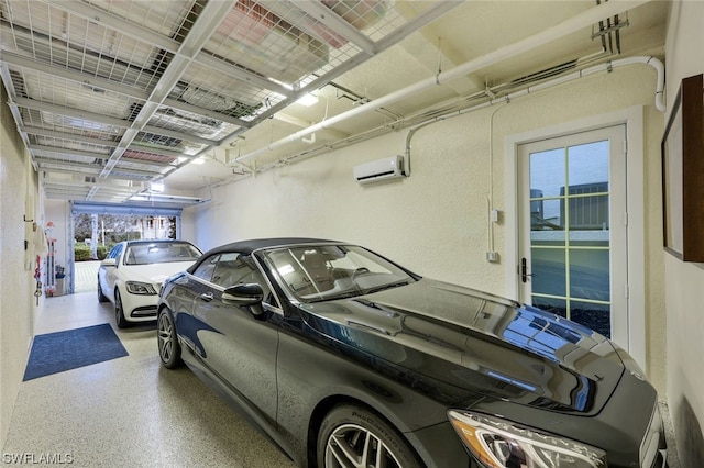 garage featuring a wall mounted AC