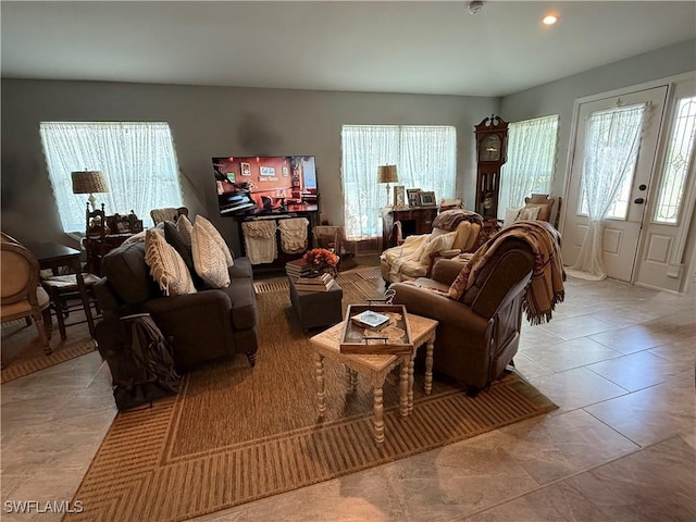 living room with plenty of natural light and recessed lighting