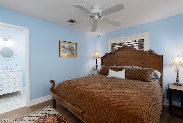 bedroom with hardwood / wood-style flooring and ceiling fan