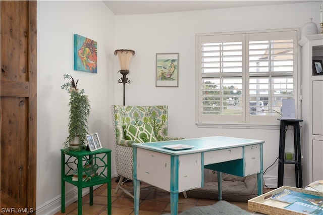 office area with tile patterned floors