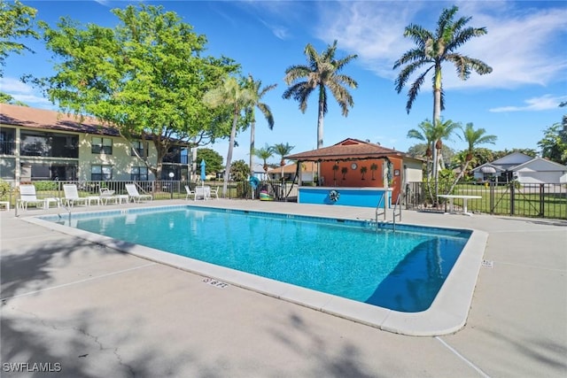 view of swimming pool featuring a patio