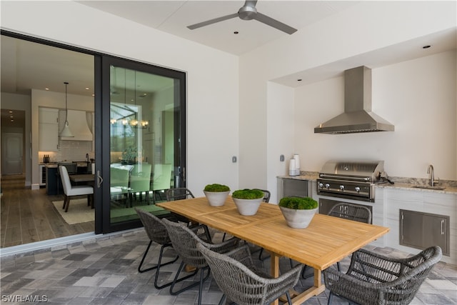 interior space with ceiling fan and sink