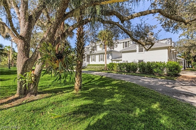 view of front of home with a front yard