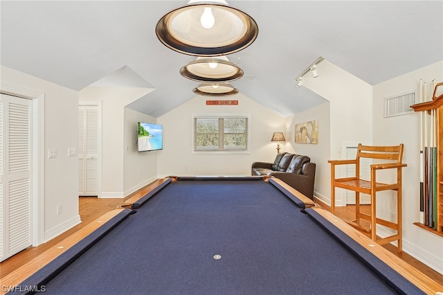 playroom with vaulted ceiling, wood-type flooring, and billiards