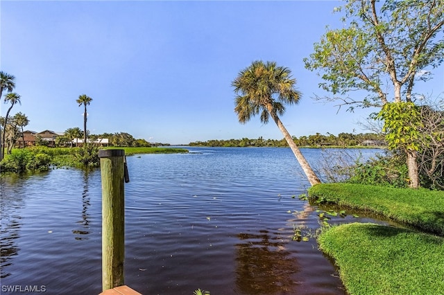 dock area featuring a water view